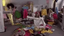 Tearing through a closet full of clothes
